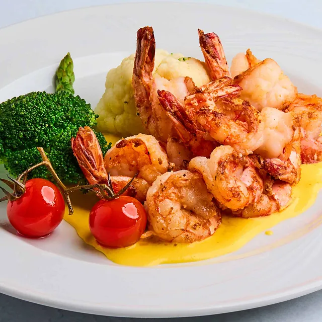 Hvitløksmarinert scampi.